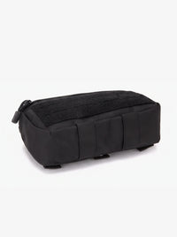 Pochette tactique MOLLE noire posée à plat